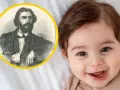 Uśmiechnięte dziecko obok portretu mężczyzny. Czy to zapowiedź, że Roman znaczenie imienia będzie miał silne?