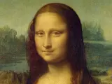 Portret Mony Lisy, arcydzieło o nieocenionej wartości artystycznej i historycznej, z tajemniczym uśmiechem na tle krajobrazu.