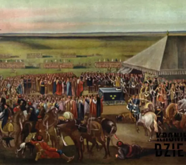 Uroczystość na polach, tłumy ludzi i namioty. Scena nawiązuje do wydarzeń z okresu potopu szwedzkiego, data nieznana.